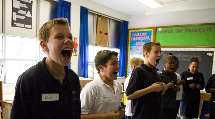 students in class yelling on queue